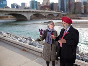 Ward 7 Councillor Druh Farrell and Calgary Skyview MP Darshan Kang chat along the Bow River following the announcement of federal infrastructure funding for flood protection on Nov. 10, 2016. The project includes $10 million for a new pump station in Sunnyside.