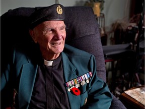 Veteran Rev. Robert Green fought in a Sherman tank in Europe during World War II. He was photographed in his Calgary home for a Remembrance Day story on Wednesday November 2, 2016.