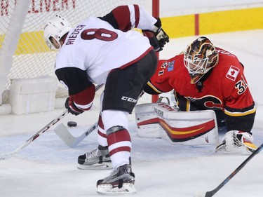 Tobias Rieder of the Arizona Coyotes puts the puck past Calgary Flames goalie Chad Johnson near the end of the second period at the Saddledome Wednesday November 16, 2016.