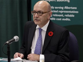 Alberta Auditor General Merwan Saher speaks about his October Report at a news conference in Edmonton, Alta., on Monday, Nov. 4, 2013. Saher has 15 recommendations to government listed in his report. Ian Kucerak/Edmonton Sun/QMI Agency