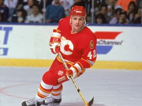 Russian hockey player Sergei Makarov of the Calgary Flames on the ice during a game, early 1990s.