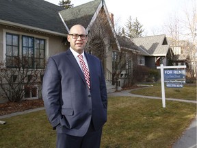 Shamon Kureshi, President and Managing Broker for Hope Street Real Estate Corp. poses in front of a rental property on 4 St SW in Calgary, Alta on Thursday November 24, 2016. The company says a record 37% of Calgary's available rental listings are currently sitting empty. Jim Wells//Postmedia