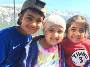 After more than two years of battling an aggressive brain tumour that affected her vision, speech and coordination, seven-year-old Sofia Hirani (centre) will climb onto the Polar Express this Thursday,  cancer-free.