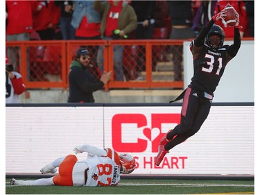 Calgary Stampeders Jamar Wall with a touchdown after the interception against the BC Lions  during 2016 CFLís West Division Final