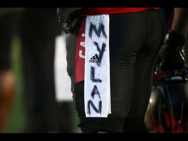 Calgary Stampeders honour teammate Mylan Hicks, who was murdered in September, during their game against the BC Lions in Western Final CFL action at McMahon Stadium in Calgary, Alta.. on Sunday November 20, 2016. Leah hennel/Postmedia