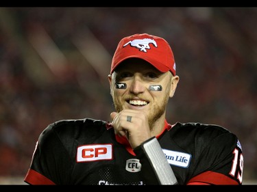 Calgary Stampeders quarterback Bo Levi Mitchell smiles during their Western Final game against the BC Lions during CFL action at McMahon Stadium in Calgary, Alta.. on Sunday November 20, 2016. Leah hennel/Postmedia