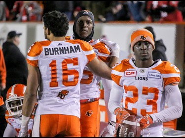 BC Lions Bryan Burnham, Stephen Adekolu and Anthony Gaitor unhappy on the bench against the Calgary Stampeders in Western Final CFL action at McMahon Stadium in Calgary, Alta.. on Sunday November 20, 2016. The Stamps beat the Lions 42-15. Mike Drew/Postmedia