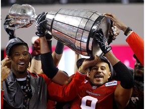 The Calgary Stampeders' star running back Jon Cornish celebrates winning the 102nd Canadian Football League Grey Cup championship. The Stamps beat the Hamilton Tiger-Cats 20-16 in Vancouver on Sunday, Nov. 30, 2104.