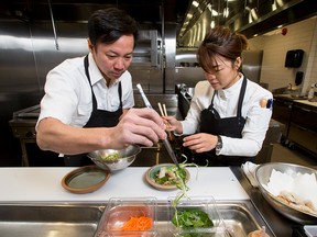 Executive chef Jinhee Lee and Chef/owner Duncan Ly prep a pair of imperial roll dishes at Foreign Concept, located at 1011 1 St SW in Calgary.