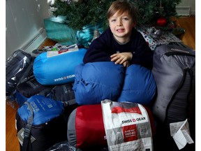 Tate Parker, 6, has been collecting sleeping bags for the homeless and is pictured at his home in Calgary, Alta., on Friday December 16, 2016