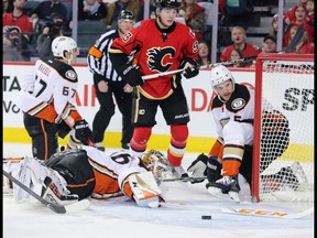 Calgary Flames forward Michael Frolik trys to get the puck past Anaheim Ducks goaltender John Gibson at the Scotiabank Saddledome on Thursday, Dec. 29, 2016. (Gavin Young)