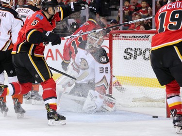 Mikael Backlund's shot goes past Ducks goaltender John Gibson during the NHL action between the Calgary Flames and Anaheim at the Scotiabank Saddledome in Calgary on Thursday December 29, 2016.