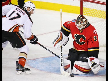 Calgary Flames goaltender Chad Johnson stops this scoring chance by the Anaheim Mighty Ducks' Ryan Kesler at the Scotiabank Saddledome in Calgary on Thursday December 29, 2016.