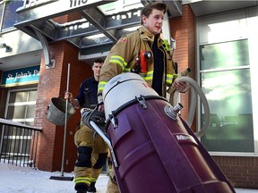 Calgary Fire Services responded to a call for flooding at an apartment building on the corner of 3rd Avenue and 10th Street NW on December 25. RYAN MCLEOD/POST MEDIA CALGARY