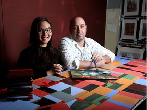 Alice Lam and artist Mark Vazquez-Mackay at his studio in Calgary on Dec. 28, 2016, with some of the tiles painted by seniors and families which will be assembled into a mosaic mural for Chinese New Year.