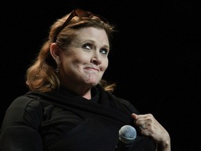 FILE PHOTO: Calgary Herald CALGARY, AB: April 27, 2013 - Actress Carrie Fisher speaks in the Corral at the Calgary Comic and Entertainment Expo on Saturday April 27, 2013.