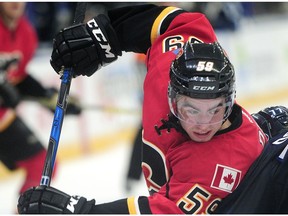 Calgary Flames prospect Dillon Dube plays the body during the 2016 NHL Young Stars Classic at the South Okanagan Events Centre in Penticton, BC., on Sept. 16, 2016. (File)