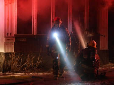 Calgary firefighters extinguish a fire in a mobile home at the Midfield Mobile Home Park on Wednesday evening December 7, 2016.