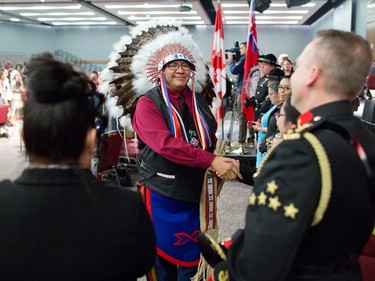 New Tsuut'ina Chief Lee Crowchild shakes hands with  tribe members and guests following his official swearing in ceremony at the Grey Eagle Casino Events Centre on Thursday December 8, 2016.