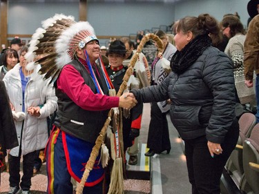 New Tsuut'ina Chief Lee Crowchild shakes hands with  tribe members and guests following his official swearing in ceremony at the Grey Eagle Casino Events Centre on Thursday December 8, 2016.