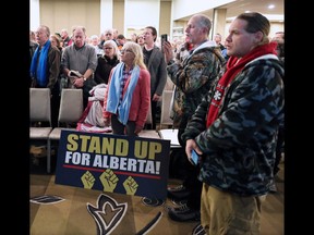 A large crowd attends an anti-carbon tax rally at the Westin Hotel in Calgary on Sunday.