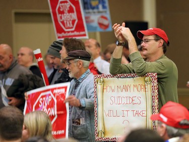 A large crowd listens to Ezra Levant speak during Rebel Media's anti carbon tax rally held at the Westin Hotel in Calgary on Sunday December 11, 2016.
