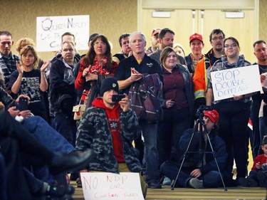 A large crowd listens to Ezra Levant speak during Rebel Media's anti carbon tax rally held at the Westin Hotel in Calgary on Sunday December 11, 2016.