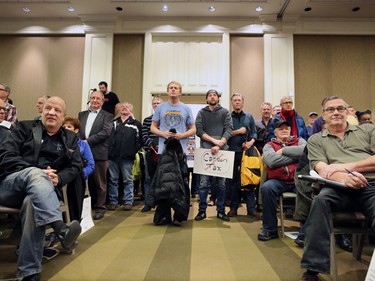 A large crowd listens to Ezra Levant speak during Rebel Media's anti carbon tax rally held at the Westin Hotel in Calgary on Sunday December 11, 2016.