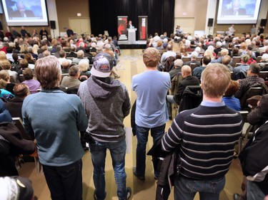 A large crowd listens to Ezra Levant speak during Rebel Media's anti carbon tax rally held at the Westin Hotel in Calgary on Sunday December 11, 2016.