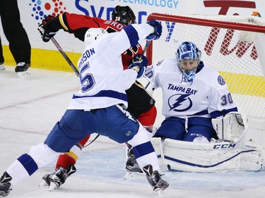 The Calgary Flames' Troy Brouwer scores on Tampa Bay Lightning goaltender Ben Bishop during NHL action at the Scotiabank Saddledome on Wednesday December 14, 2016.