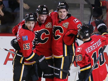 The Calgary Flames celebrate Troy Brouwer goal on Tampa Bay Lightning goaltender Ben Bishop during NHL action at the Scotiabank Saddledome on Wednesday December 14, 2016.