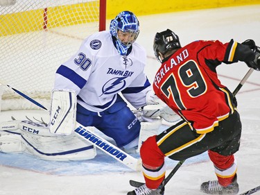 Calgary Flames winger Micheal Ferland's break away chance is stopped by Tampa Bay Lightning goaltender Ben Bishop during NHL action against the the Tampa Bay Lightning at the Scotiabank Saddledome on Wednesday December 14, 2016.