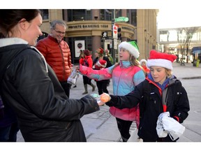Calgarians enjoyed some Christmas cheer from Project Long Table kids Cole Archibald, and Sophia Rogers on December 19. Project Long Table is a group of neighbours from Discovery Ridge who gathered downtown on Stephen Avenue to spread the holiday spirit.