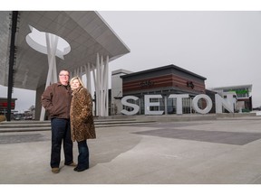 Doug and Poona Hartl in southeast Calgary's Seton development. They bought at Cedarglen's Seton Park Place.