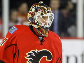 Calgary Flames goalie Chad Johnson warms up before the game against the Minnesota Wild in NHL hockey action at the Scotiabank Saddledome in Calgary, Alta. on December 2, 2016.