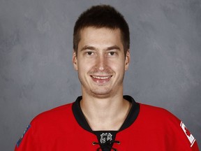 CALGARY, AB – SEPTEMBER 22: David Rittich of the Calgary Flames poses for his official headshot for the 2016-2017 season on September 22, 2016 at the WinSport Winter Sport Institute at Canada Olympic Park in Calgary, Canada.