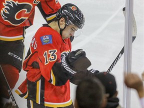 Calgary Flames Johnny Gaudreau celebrates his goal against Anaheim Ducks goalie Jonathan Bernier for the Flames first goal in NHL hockey action at the Scotiabank Saddledome in Calgary, Alta. on Sunday December 4, 2016.