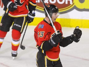 Calgary Flames Sam Bennett celebrates after putting the puck past past Anaheim Ducks goalie Jonathan Bernier in NHL hockey action at the Scotiabank Saddledome in Calgary, Alta. on Sunday December 4, 2016. Mike Drew/Postmedia