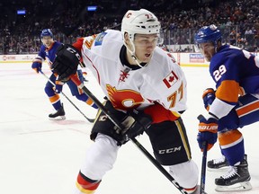 NEW YORK, NY - NOVEMBER 28:  Mark Jankowski #77 of the Calgary Flames skate sin his first NHL game against the New York Islanders at the Barclays Center on November 28, 2016 in the Brooklyn borough of New York City.