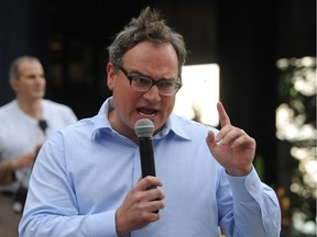 Ezra Levant speaks to a crowd of  a few hundred at a Calgary for Israel rally at city hall in downtown Calgary, Alta. on Thursday July 31, 2014. The event was being held to show solidarity with the Israeli people while condemning pro-Palestinian supporters who attacked members of a Jewish family during what he called a pro-Hamas rally two weeks ago.Stuart Dryden/Calgary Sun/QMI Agency