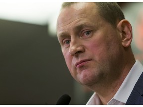 Calgary Flames general manager Brad Treliving speaks to media at the Scotiabank Saddledome in Calgary, Alta., on Tuesday, May 3, 2016. The Flames had just fired head coach Bob Hartley and associate coach Jacques Cloutier. Lyle Aspinall/Postmedia Network