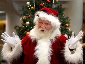 Santa, whose elf name is Michael Shepherd, poses in Calgary, Alta on Friday December 16, 2016. Jim Wells//Postmedia