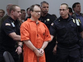 Green River Killer Gary Ridgway stands to be escorted out following his arraignment on charges of murder in the 1982 death of Rebecca "Becky" Marrero, Friday, Feb. 18, 2011, at the King County Regional Justice Center in Kent., Wash. Authorities hope a facial reconstruction of a girl who was slain by a Seattle-area serial killer will help identify the victim, who tests show may have spent time in several Canadian provinces.