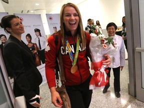 Gold medal winning wrestler Erica Wiebe arrives at Pearson on a flight from Rio on Tuesday August 23, 2016.