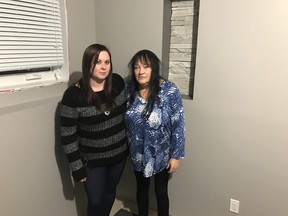 Former Calgary woman Gloria Boyer (right) with daughter Amanda Day at her home in Brandon, MB. Boyer says all her worldly possessions have been missing four weeks since her move from Calgary and she fears is the victim of a scam. Supplied photo