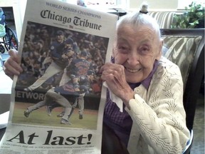FILE PHOTO: In this Nov. 4, 2016 photo provided by the Strobel Family, Cubs fan Helen Weithman, celebrates the Chicago Cubs World Series victory at her home in Glen Ellyn, Ill. A lifelong Cubs fan Weithman, 98, who according to family was slipping away until the Cubs made it to The World Series, "She really came alive when it started and they had the Cubs games on," said the daughter, Kathleen Strobel. Weithman died on Nov. 29, 2016 after finally seeing the Cubs win the series for first time in her lifetime.