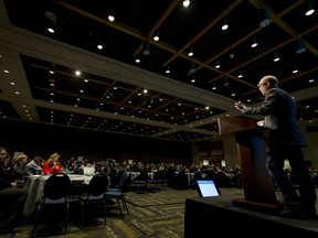 Mark Heilman, co-founder of the GoldMind Project, introduces the Prospecting Calgary's GoldMind event at the Telus Convention Centre in downtown Calgary, Alta., on Wednesday, Dec. 7, 2016. More than 350 unemployed professionals, employers and community advocates were part of the roundtable-discussion event to mobilize the city's pool of underutilized professional talent and prepare Calgary and Alberta for the future of work. Lyle Aspinall/Postmedia Network