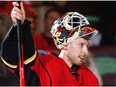 Calgary Flames Chad Johnson salutes the crowd after being named the first star of the game against the Toronto Maple Leafs during NHL hockey in Calgary, Alta., on Wednesday, November 30, 2016.