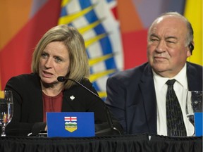 Northwest Territories Premier Bob McLeod looks on as Alberta Premier Rachel Notley speaks during the closing news conference at the First Ministers Meeting in Ottawa, Friday December 9, 2016.