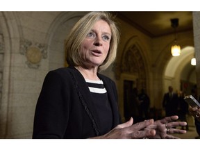 Alberta Premier Rachel Notley speaks to reporters during a media availability.